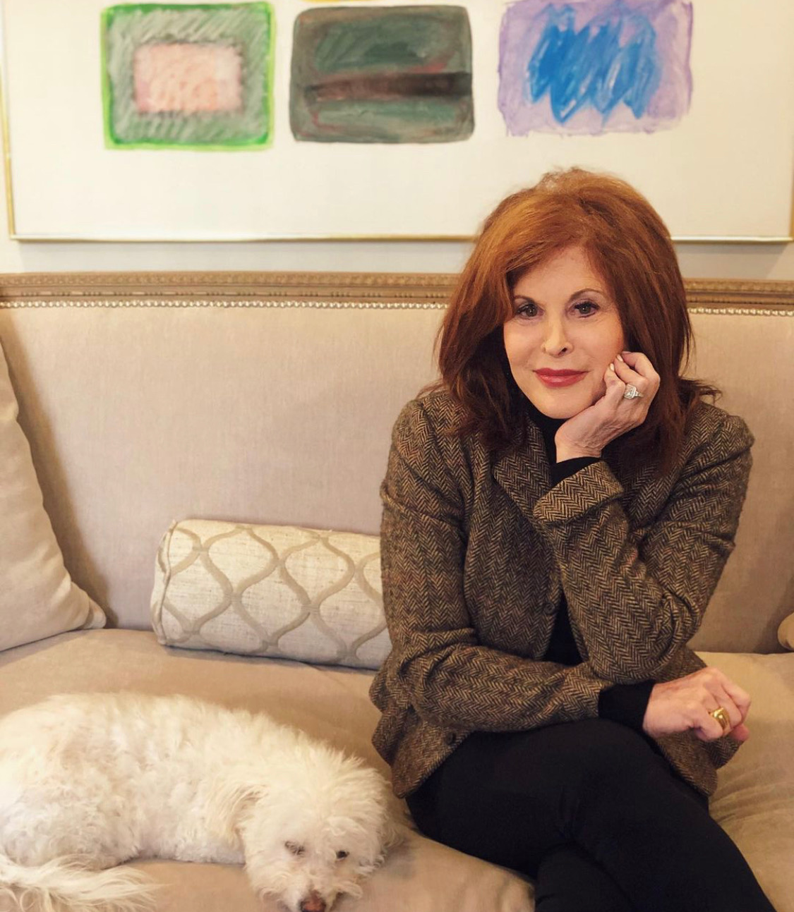 A headshot of Lorraine Jacobs with her dog.